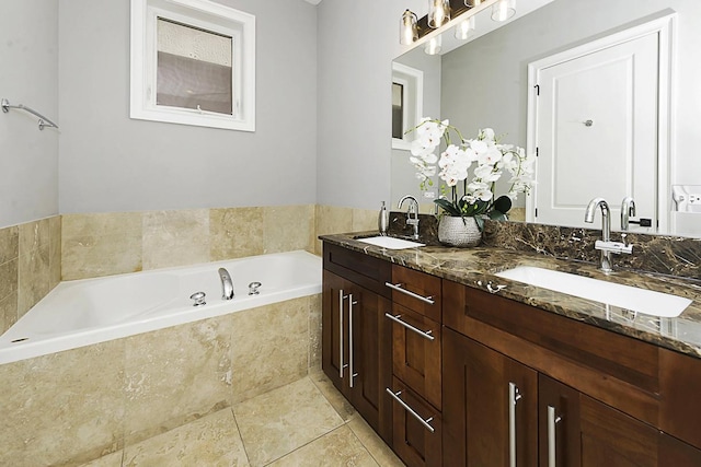 5010 W Lawrence Ave Unit 3B, Chicago, IL 60630 - full bathroom featuring double vanity, a bath, and tile patterned floors