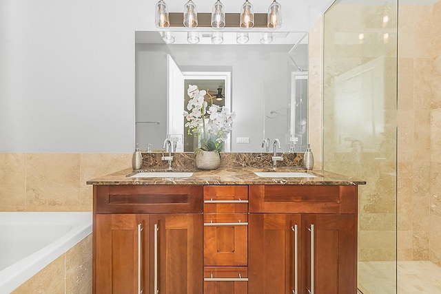 5010 W Lawrence Ave Unit 3B, Chicago, IL 60630 - bathroom with a garden tub, double vanity, and walk in shower