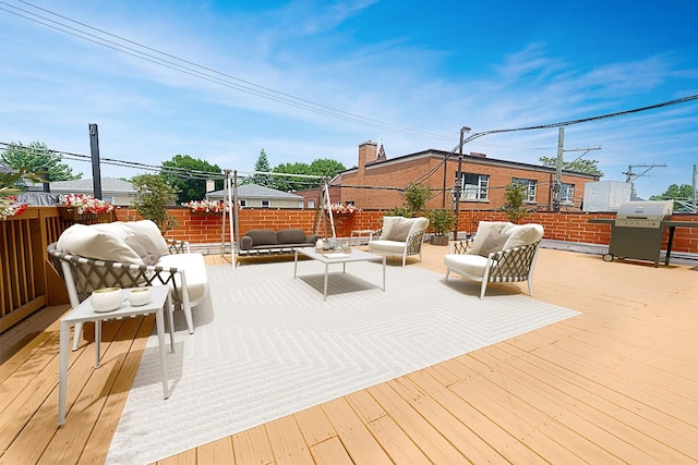 5010 W Lawrence Ave Unit 3B, Chicago, IL 60630 - deck featuring an outdoor living space, a grill, and a fenced backyard