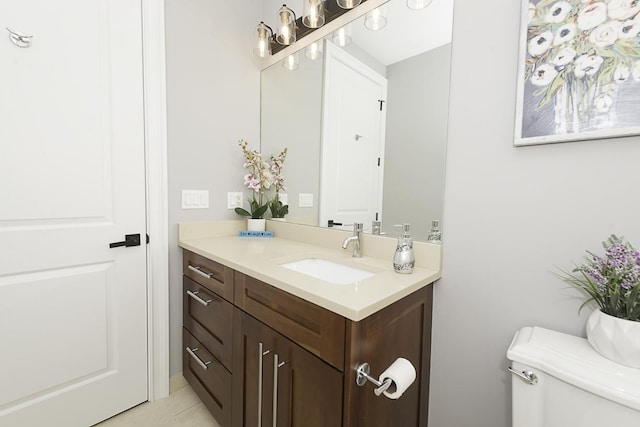 5010 W Lawrence Ave Unit 3B, Chicago, IL 60630 - half bathroom featuring vanity and tile patterned flooring