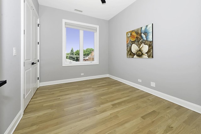 5010 W Lawrence Ave Unit 3B, Chicago, IL 60630 - spare room featuring light wood-type flooring and baseboards