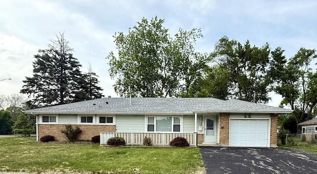 408 Sauk Trl, Park Forest, IL 60466 - ranch-style home with a garage, a front yard, driveway, and brick siding