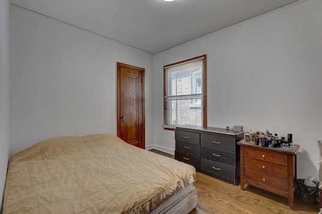 2916 N Melvina Ave, Chicago, IL 60634 - bedroom featuring light wood-style floors and baseboards