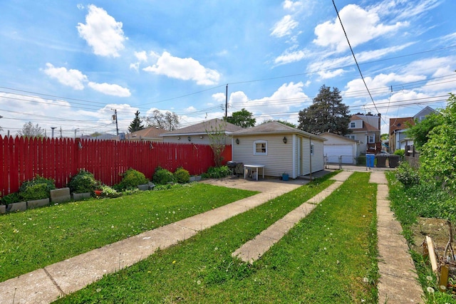 2916 N Melvina Ave, Chicago, IL 60634 - view of yard featuring a detached garage and a patio