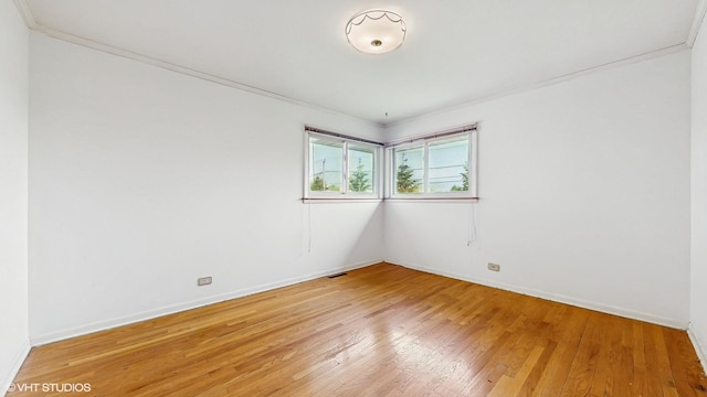 80 E Fremont Ave, Des Plaines, IL 60016 - empty room featuring light wood-style floors and ornamental molding