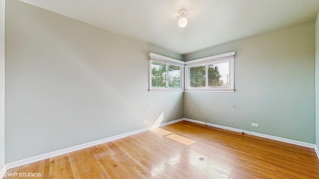 80 E Fremont Ave, Des Plaines, IL 60016 - empty room featuring light wood-style floors and baseboards
