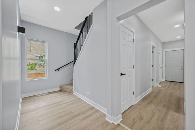 6721 S Ada St, Chicago, IL 60636 - stairway with wood finished floors and recessed lighting