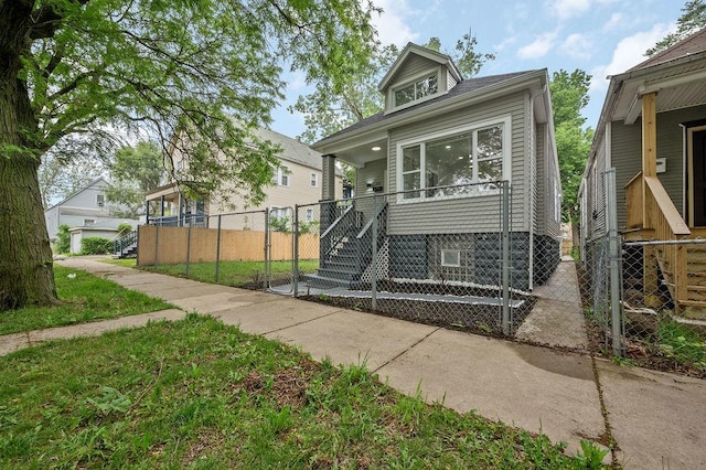 6721 S Ada St, Chicago, IL 60636 - view of front of property featuring stairway and covered porch