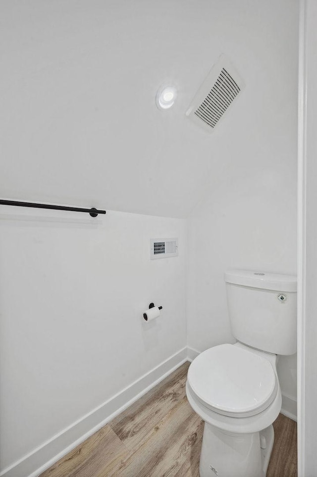 6721 S Ada St, Chicago, IL 60636 - bathroom featuring wood finished floors and baseboards