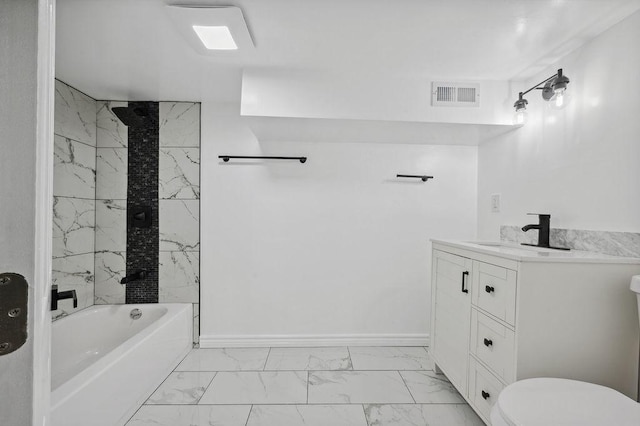 6721 S Ada St, Chicago, IL 60636 - bathroom with marble look tiles, vanity, and shower / bathtub combination