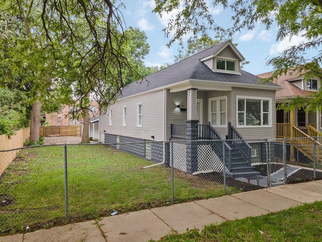 6721 S Ada St, Chicago, IL 60636 - view of front of property featuring a shingled roof and a porch
