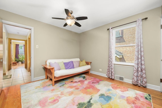 3010 Wisconsin Ave, Berwyn, IL 60402 - sitting room with a ceiling fan and wood finished floors