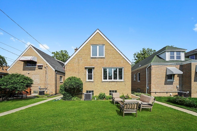3010 Wisconsin Ave, Berwyn, IL 60402 - rear view of property featuring brick siding and a lawn