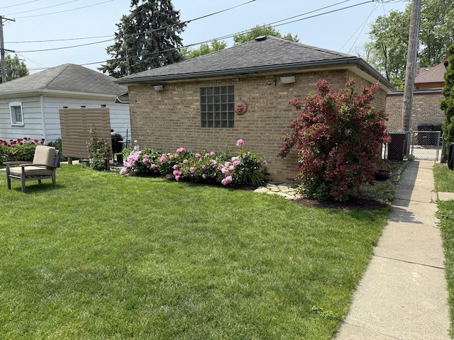 3010 Wisconsin Ave, Berwyn, IL 60402 - view of side of property with brick siding and roof with shingles