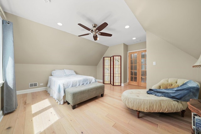 3010 Wisconsin Ave, Berwyn, IL 60402 - bedroom with light wood-style floors, lofted ceiling, a ceiling fan, french doors, and recessed lighting