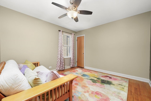 3010 Wisconsin Ave, Berwyn, IL 60402 - bedroom with light wood-style floors and ceiling fan