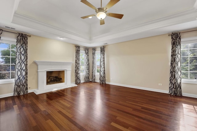 445 E Crescent Ave, Elmhurst, IL 60126 - unfurnished living room with wood finished floors, a tray ceiling, a ceiling fan, and ornamental molding