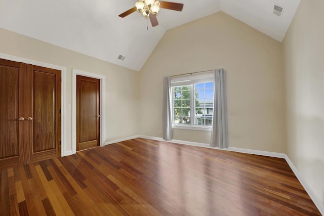 445 E Crescent Ave, Elmhurst, IL 60126 - unfurnished bedroom featuring lofted ceiling, wood finished floors, and a ceiling fan
