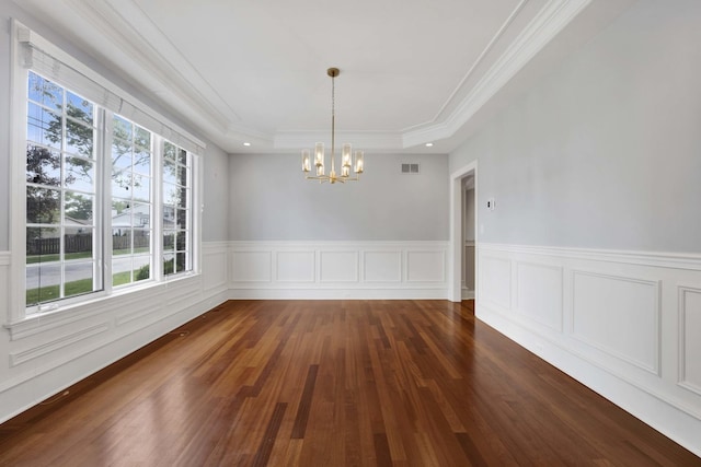445 E Crescent Ave, Elmhurst, IL 60126 - unfurnished dining area featuring a raised ceiling, a chandelier, plenty of natural light, dark wood-type flooring, and a wainscoted wall