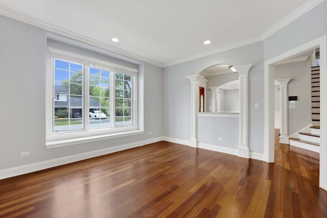445 E Crescent Ave, Elmhurst, IL 60126 - empty room featuring ornate columns, dark wood-style floors, crown molding, recessed lighting, and stairway