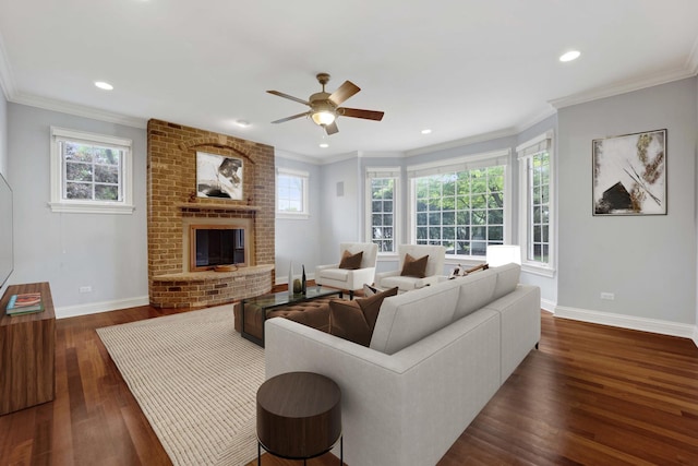 445 E Crescent Ave, Elmhurst, IL 60126 - living room featuring dark wood-type flooring, a ceiling fan, a brick fireplace, recessed lighting, and crown molding