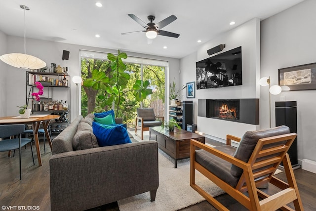 2224 N Seeley Ave Unit 2, Chicago, IL 60647 - living area featuring ceiling fan, wood finished floors, recessed lighting, and a warm lit fireplace