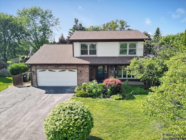 590 Woodcrest Ct, Carol Stream, IL 60188 - traditional-style house featuring driveway, an attached garage, roof with shingles, and brick siding