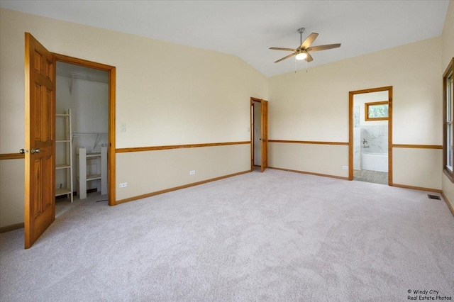 590 Woodcrest Ct, Carol Stream, IL 60188 - carpeted spare room featuring a ceiling fan and vaulted ceiling