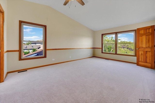 590 Woodcrest Ct, Carol Stream, IL 60188 - unfurnished room featuring vaulted ceiling, light colored carpet, and ceiling fan