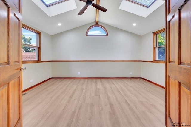 590 Woodcrest Ct, Carol Stream, IL 60188 - empty room with a skylight, light wood-style floors, ceiling fan, and recessed lighting