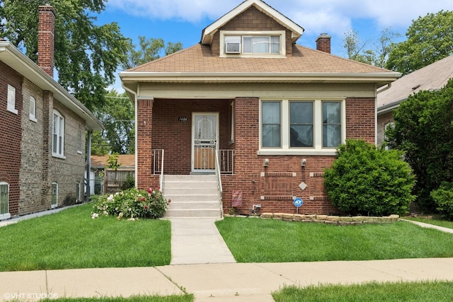 1404 W 97th St, Chicago, IL 60643 - bungalow-style home featuring a front lawn, a chimney, brick siding, a porch, and a shingled roof