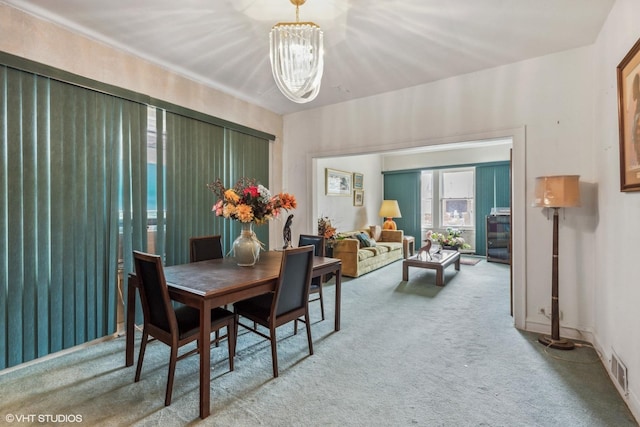 1404 W 97th St, Chicago, IL 60643 - carpeted dining room with a chandelier