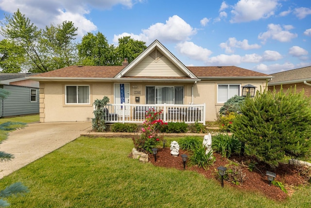 7740 Monitor Ave, Burbank, IL 60459 - single story home with a porch, a front yard, and stucco siding