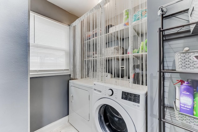 7740 Monitor Ave, Burbank, IL 60459 - laundry area with separate washer and dryer and plenty of natural light