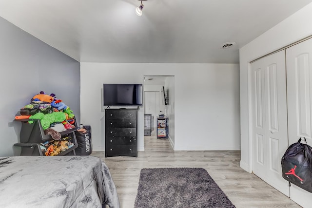 7740 Monitor Ave, Burbank, IL 60459 - bedroom with baseboards and wood finished floors