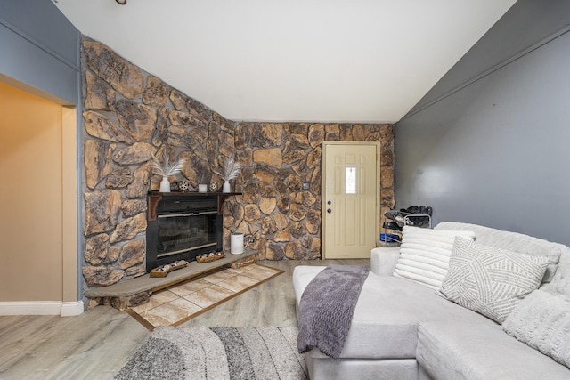 7740 Monitor Ave, Burbank, IL 60459 - living area with wood finished floors, a fireplace, and vaulted ceiling