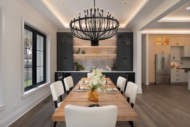 1847 Dexter Ln, Des Plaines, IL 60018 - dining area featuring a tray ceiling, dark wood finished floors, and healthy amount of natural light