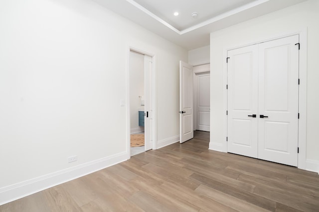 1847 Dexter Ln, Des Plaines, IL 60018 - unfurnished bedroom with light wood finished floors, recessed lighting, and a closet