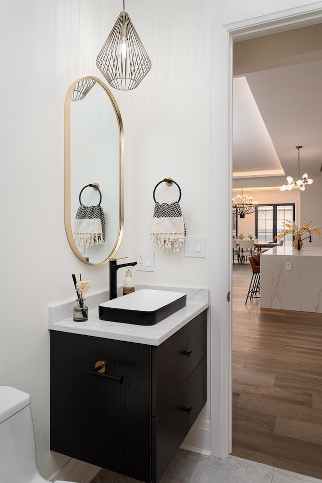 1847 Dexter Ln, Des Plaines, IL 60018 - bathroom with a chandelier and vanity