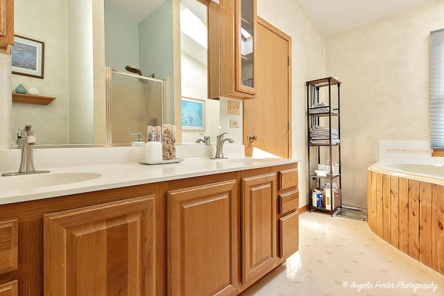 702 W Broadway St, Mchenry, IL 60051 - bathroom with a stall shower, a bath, double vanity, and tile patterned floors