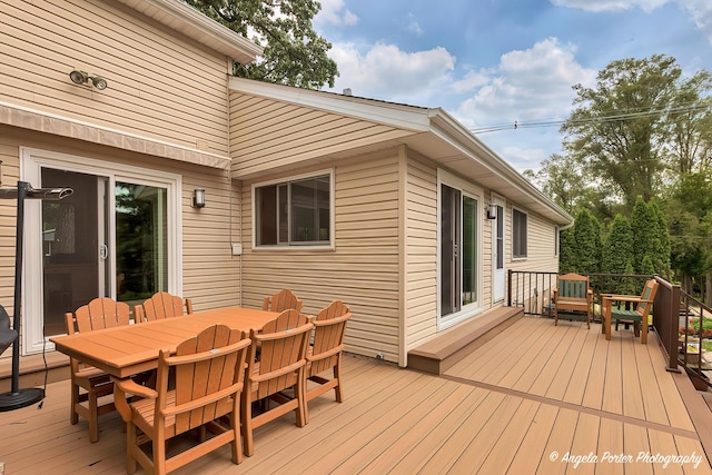 702 W Broadway St, Mchenry, IL 60051 - wooden terrace with outdoor dining space