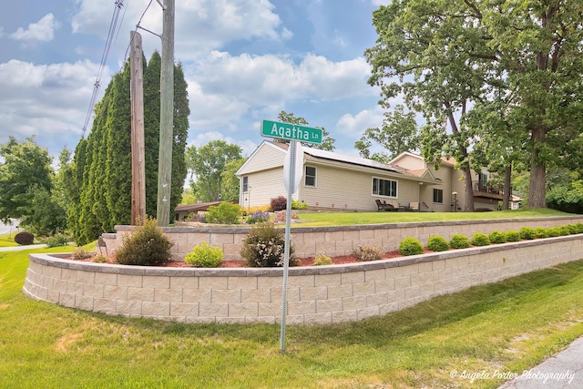 702 W Broadway St, Mchenry, IL 60051 - view of property exterior with a yard