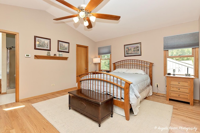 702 W Broadway St, Mchenry, IL 60051 - bedroom featuring lofted ceiling, light wood finished floors, multiple windows, and ceiling fan