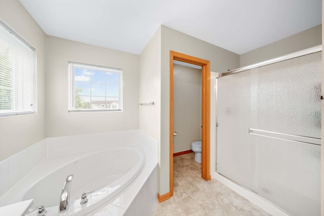 4553 Gardiner Ave, Yorkville, IL 60560 - bathroom featuring a bath, a stall shower, and tile patterned flooring