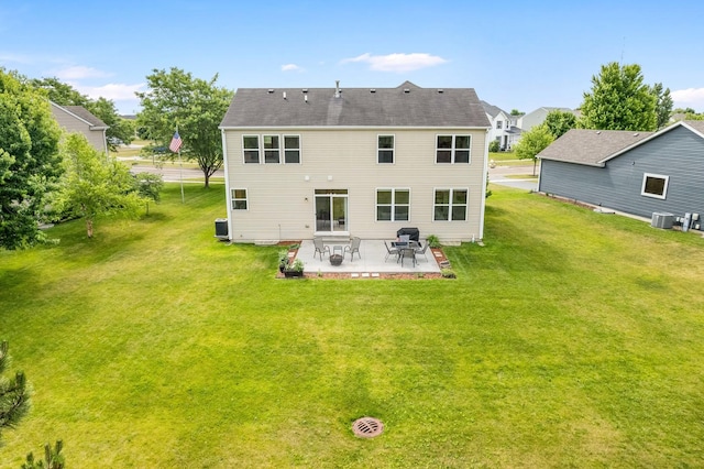4553 Gardiner Ave, Yorkville, IL 60560 - rear view of house with a patio and a lawn