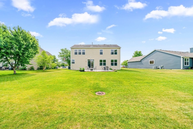 4553 Gardiner Ave, Yorkville, IL 60560 - back of house featuring a patio area and a lawn