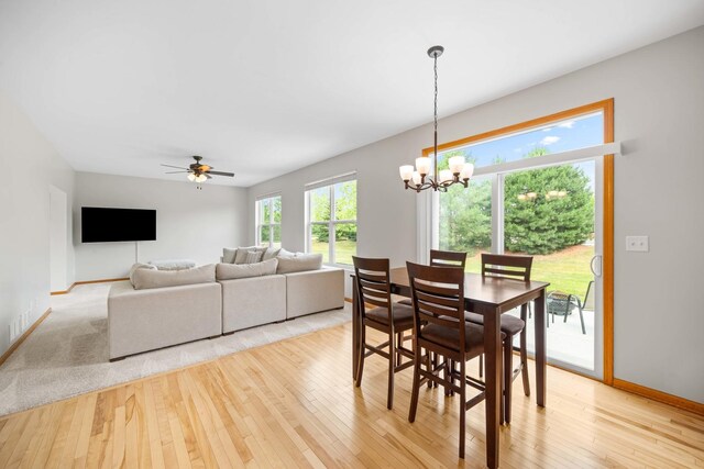 4553 Gardiner Ave, Yorkville, IL 60560 - dining area with a chandelier, light wood-style flooring, and ceiling fan