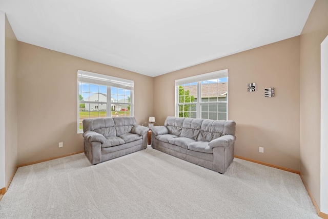 4553 Gardiner Ave, Yorkville, IL 60560 - carpeted living area featuring baseboards