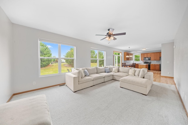 4553 Gardiner Ave, Yorkville, IL 60560 - living room featuring ceiling fan and light carpet