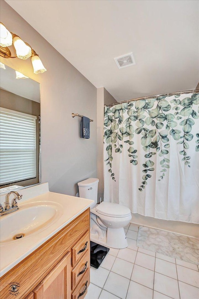 5692 W Roosevelt St, Monee, IL 60449 - bathroom with tile patterned floors, vanity, and curtained shower